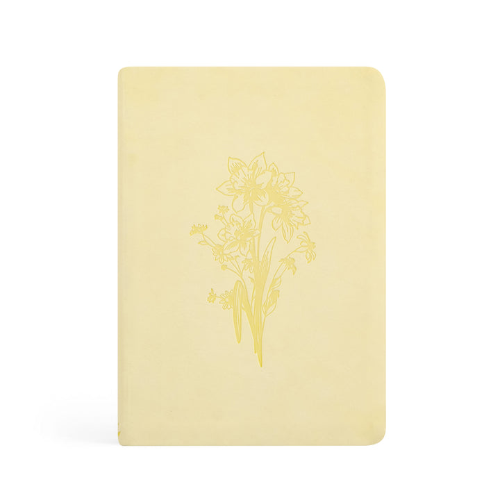Yellow notebook with floral design on a white background
