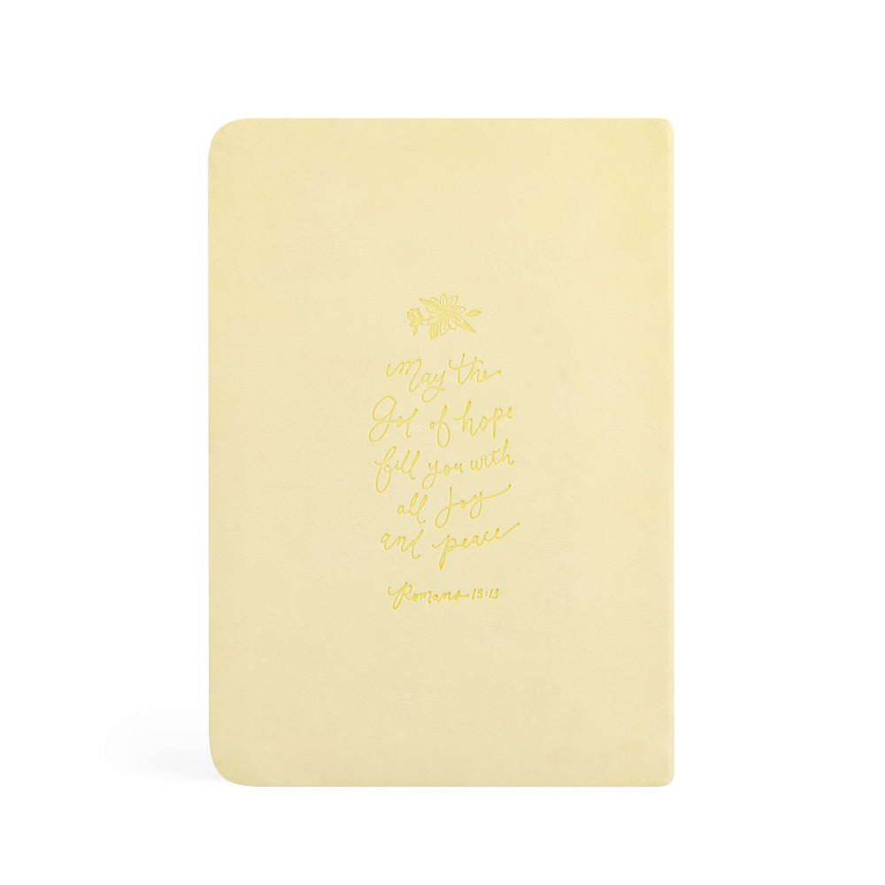 Yellow notebook with gold text on a white background