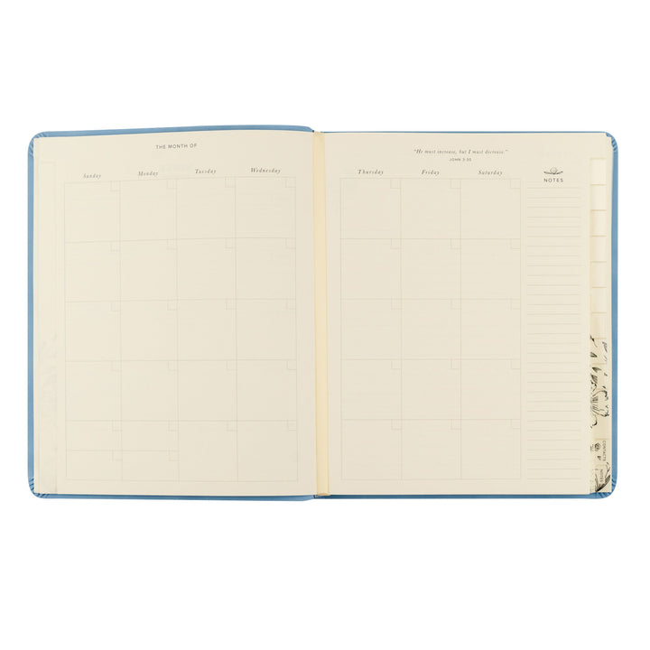Open notebook with lined pages on a white background