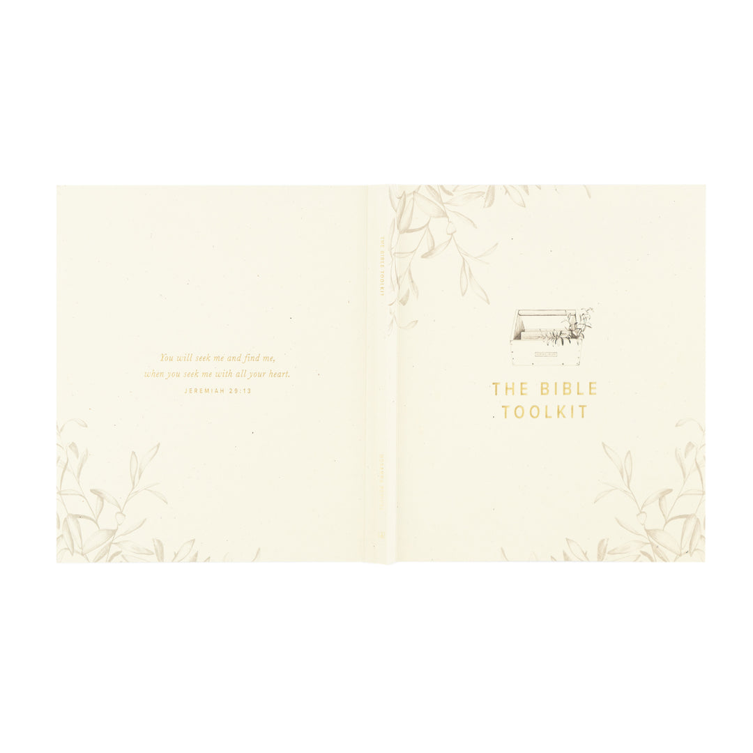 Cover of 'The Bible Toolkit' with decorative elements on a light background