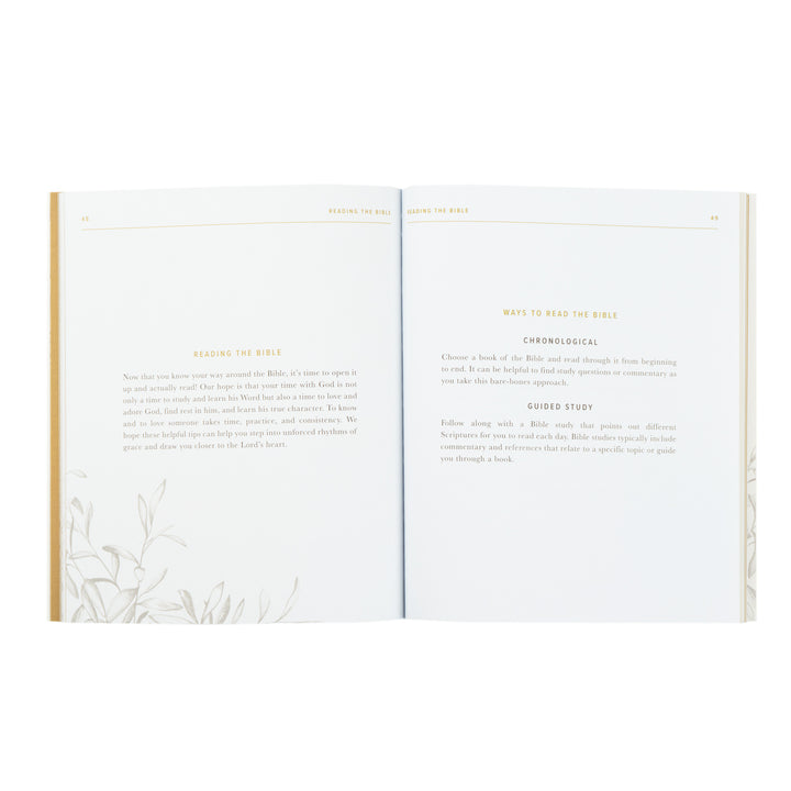 Open book with text and minimal design on a white background
