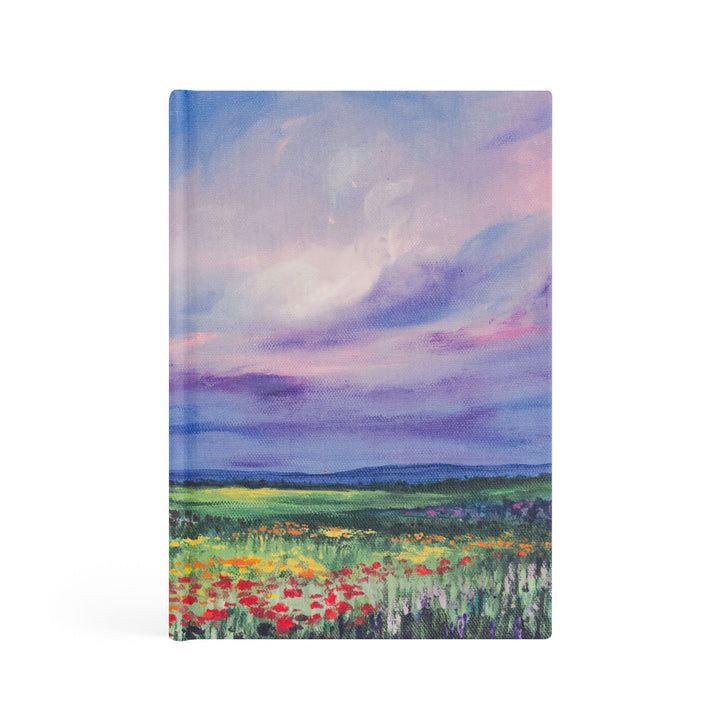 Notebook with a colorful landscape design on the cover