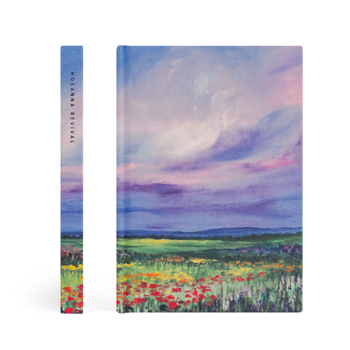 Notebook with a colorful landscape design on the cover