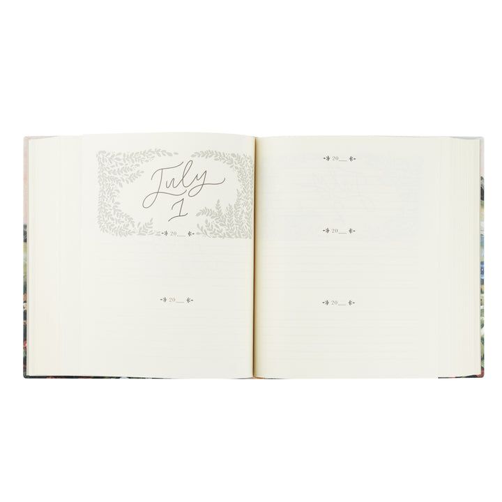 Open notebook with a page titled 'July 1' on a white background