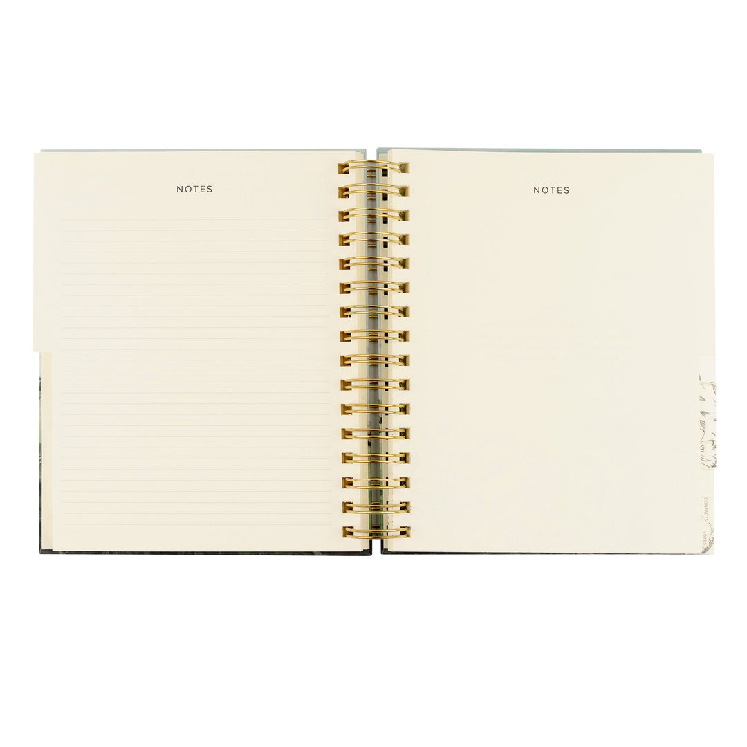 Open notebook with 'NOTES' label on each page, gold spiral binding