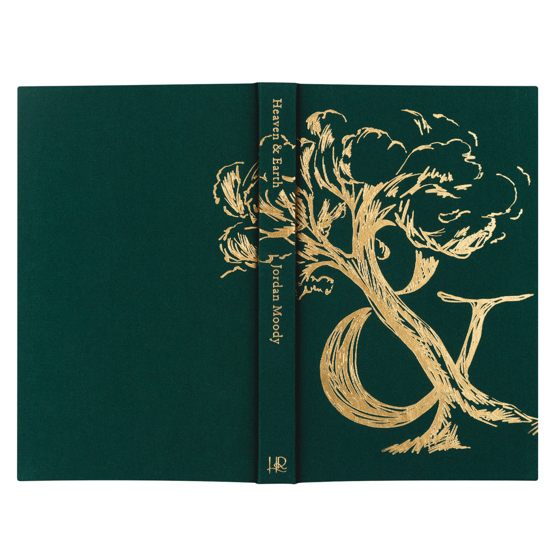 Green book with gold floral design and text on a white background