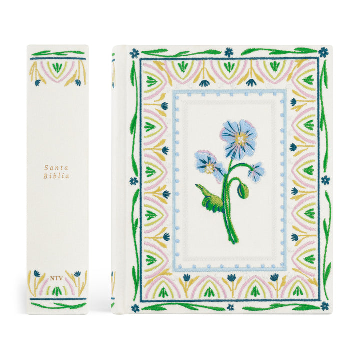 Decorative book cover with floral design and colorful border on a white background