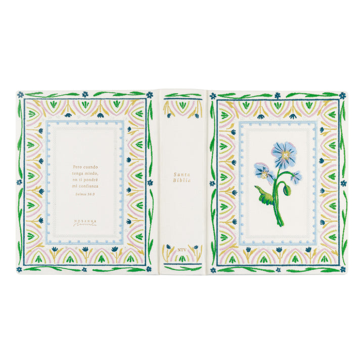 Decorative Bible with floral design and text on a white background