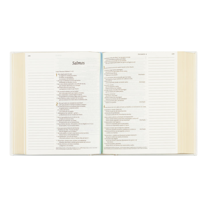 Open book showing a page with text and a table of contents on a white background