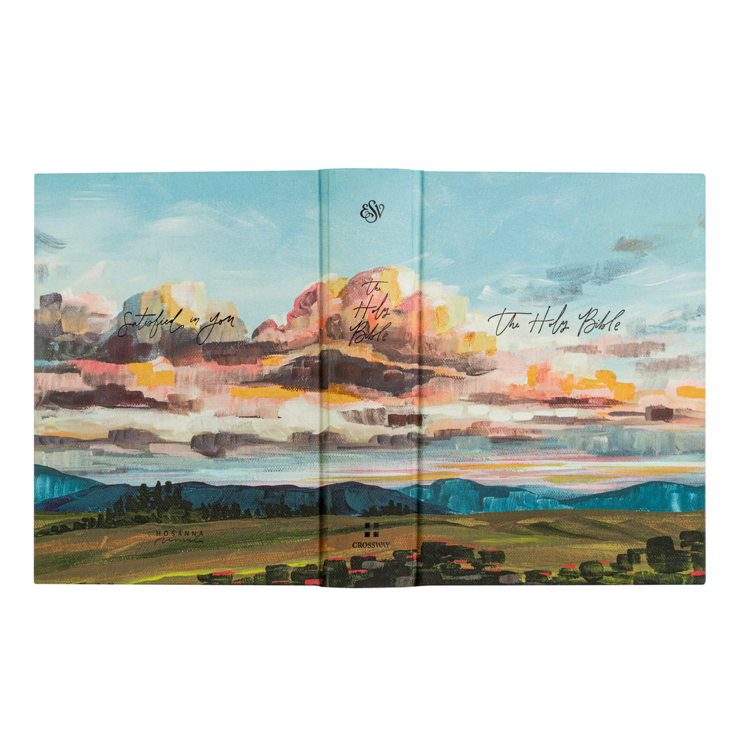 Folded book with a colorful landscape illustration on the cover