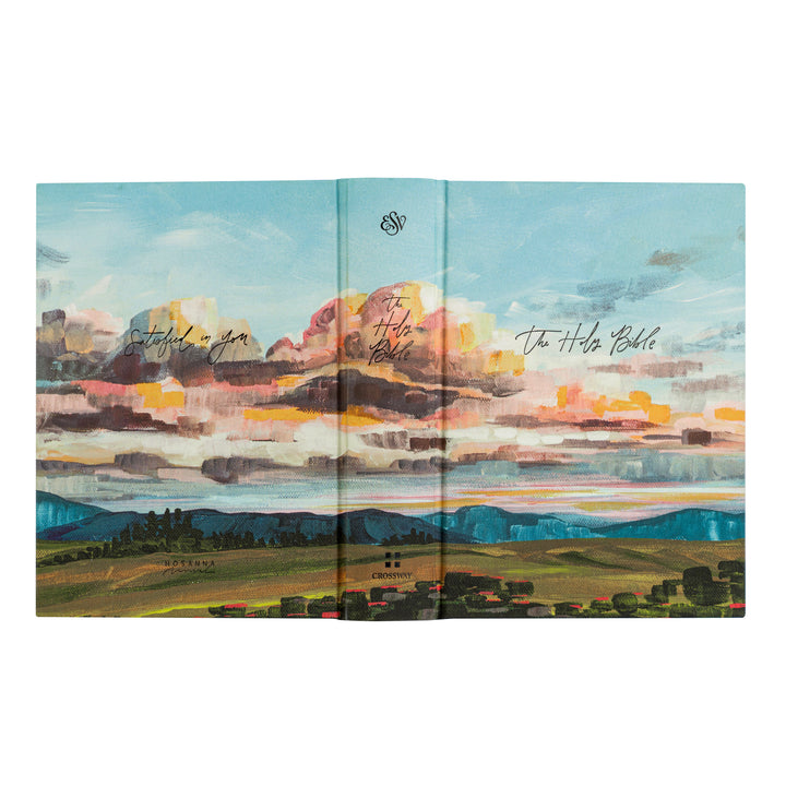 Folded book with a colorful landscape illustration on the cover