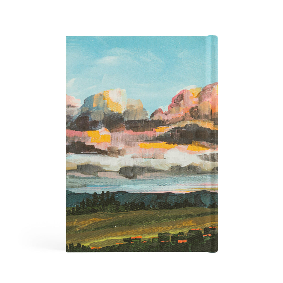 Notebook with a landscape design on the cover