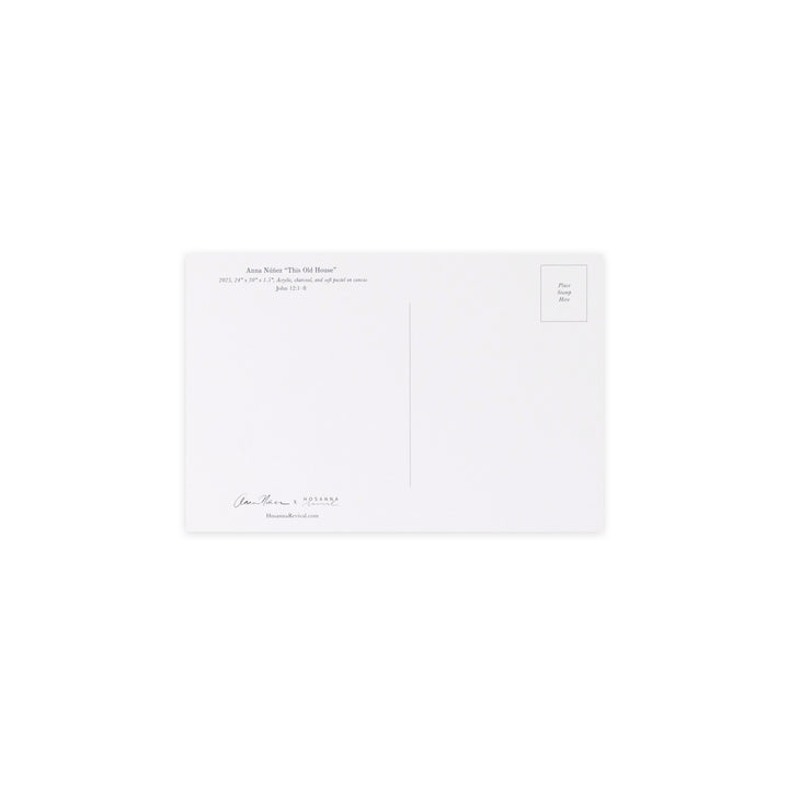 A white postcard with printed text on the front and a small address block on the back, shown against a plain white background.