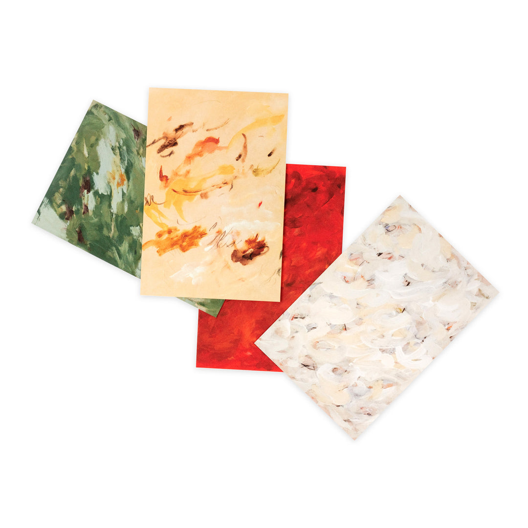 Four square art prints or cards with abstract painted designs in green, beige, red, and white, arranged overlapping on a plain white background.