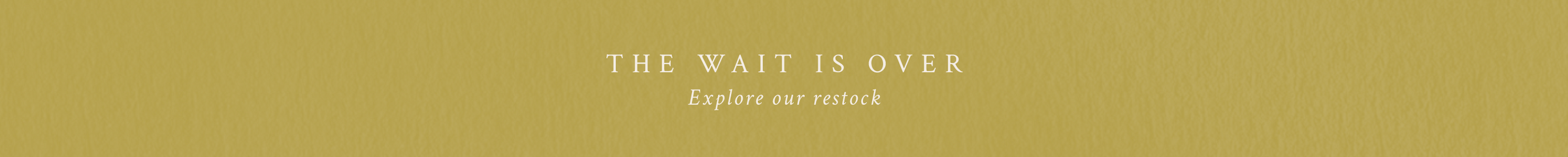 Text on a green background with 'The Wait is Over' and 'Explore our restock'.