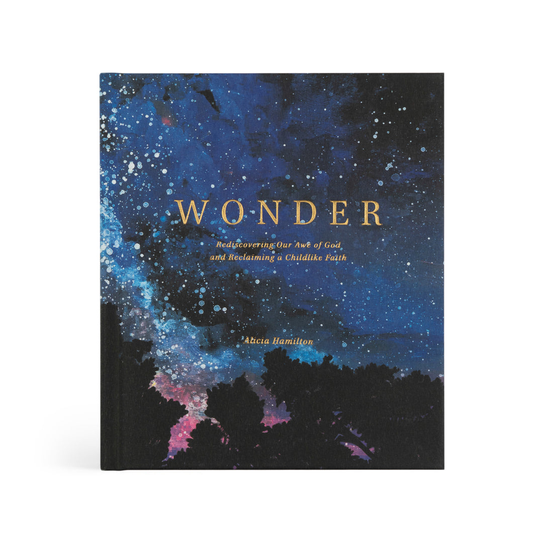 Book titled 'Wonder' with a cosmic design on the cover